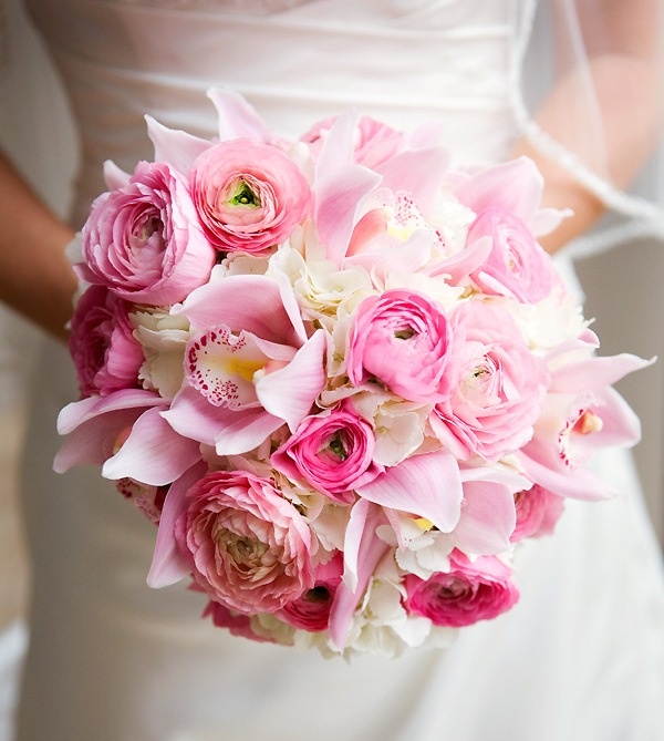 Fresh flower bouquet against wedding attire