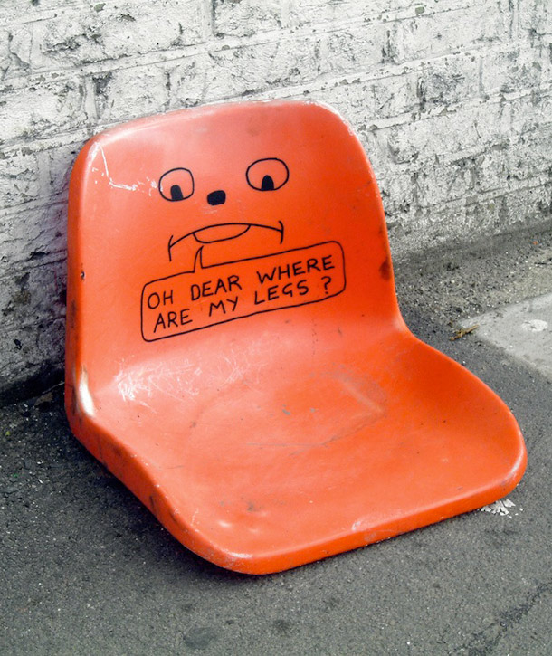 Orange plastic seat with face saying Oh dear where are my legs