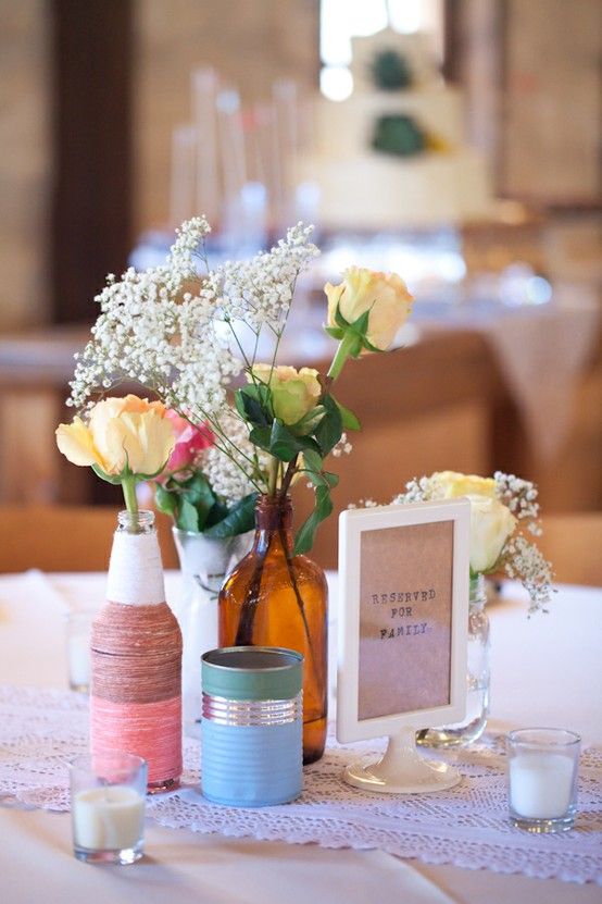 Pastel painted tin can wedding centerpiece