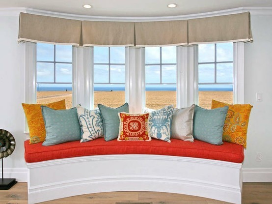 Window seat with curtains and cushions