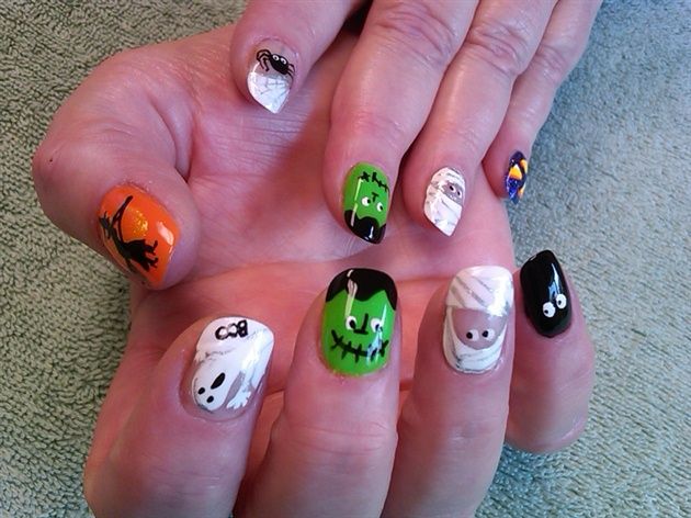 Halloween nail art with orange and black