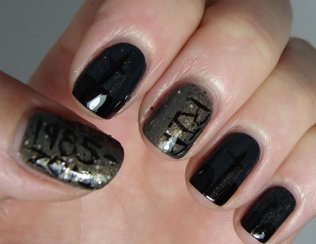 Black and orange Halloween nail art