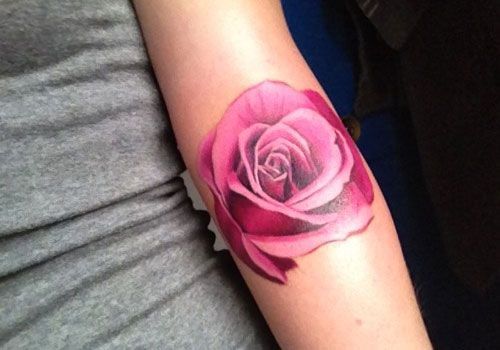 Horizontal rose tattoo composition