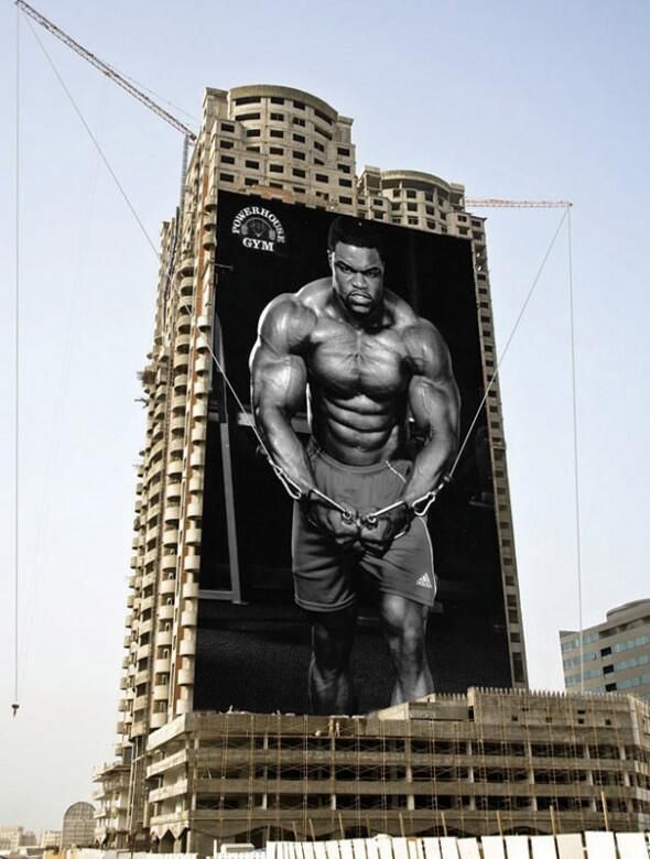 Powerhouse Gym construction crane cable crossover ad
