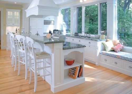 Wide window seat overlooking outdoor view