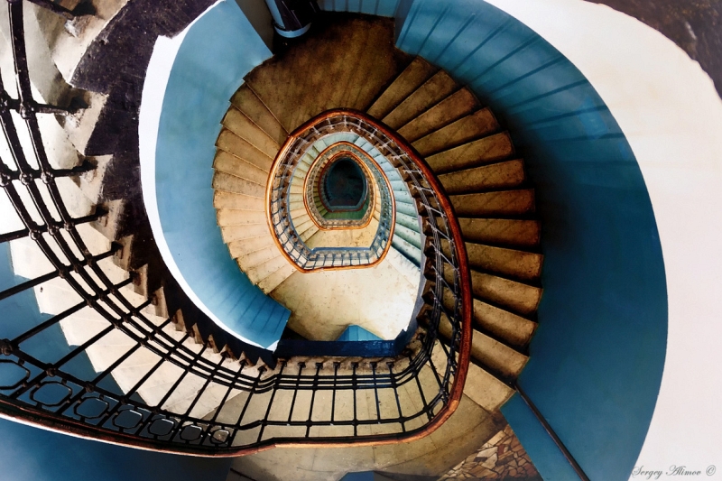 Sergey Alimov blue wall spiral staircase