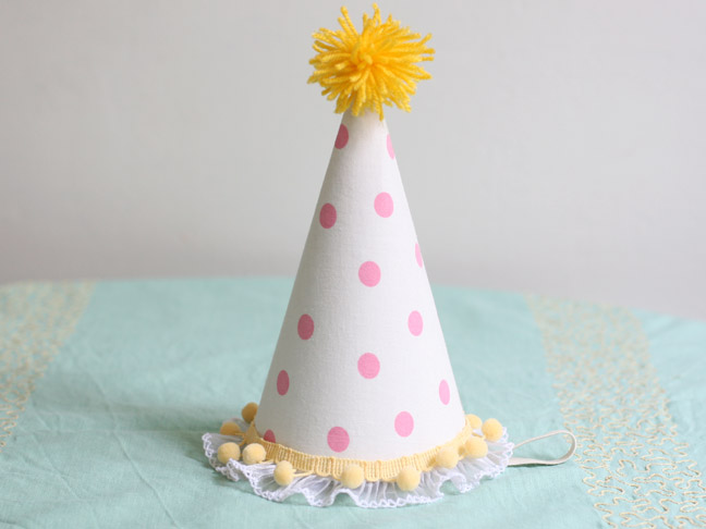 Classic cone party hats with ribbon and trim