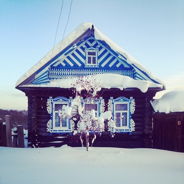 Carved wooden window trim on a Russian house