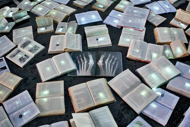 river-of-books4 Detail of open books with light