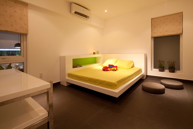 Floating bed near large windows
