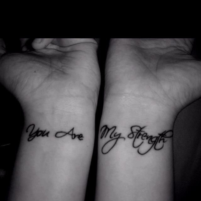 Fine-line floral wrist tattoo inspiration