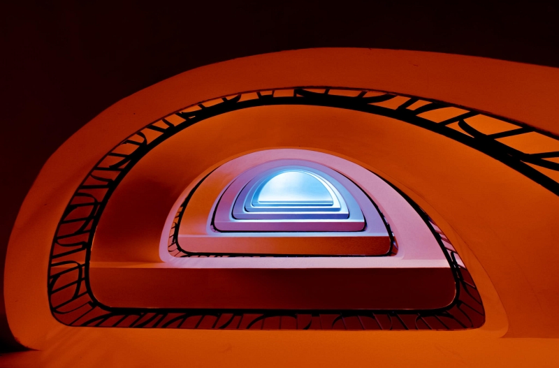 Joe Plasmatico orange to blue arched stairwell