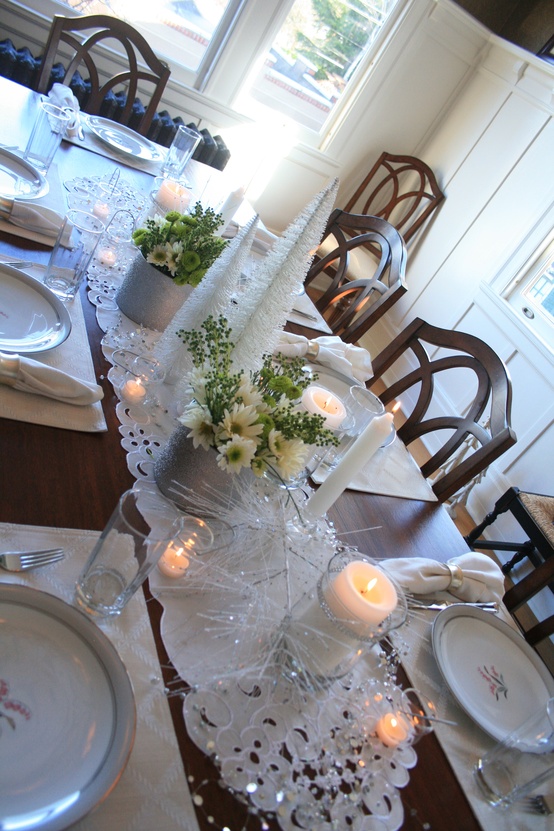 Winter tablescape with ivory tones and candlelight