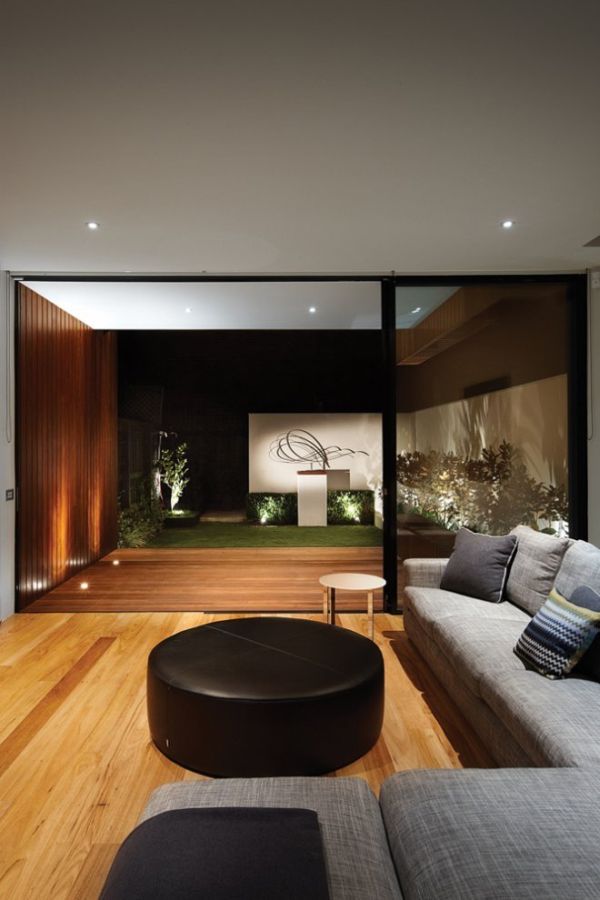 Open-plan dining and living looking toward the rear glass