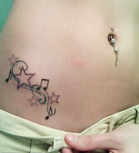 Forearm melody tattoo