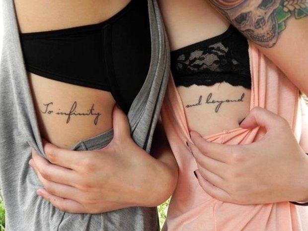 Script quote rib tattoo