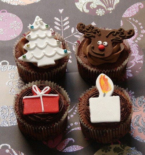 Festive cupcakes with holiday toppers