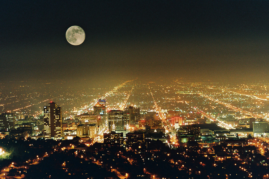 City lights spreading across a wide night landscape