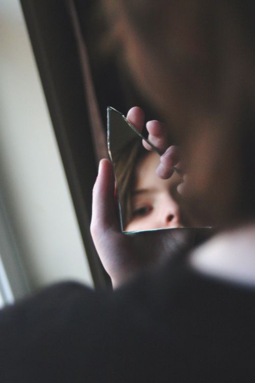 Reflective photographic portrait of a woman