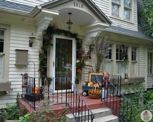 Symmetrical fall porch styling