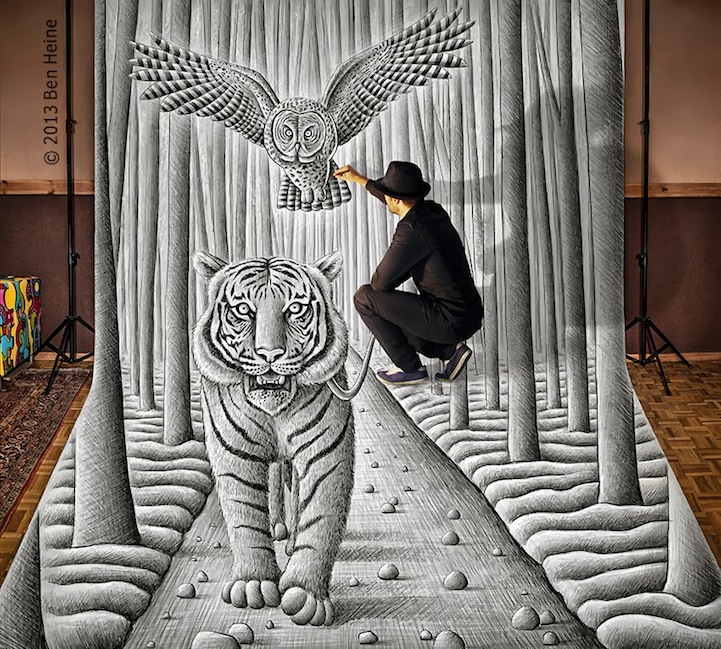 Ben Heine holding a drawing in a landscape