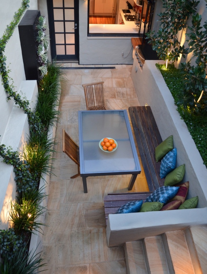 Tall wooden outdoor bench with vertical slats