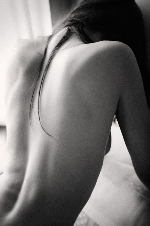 Fine-art leaning photograph of a female back