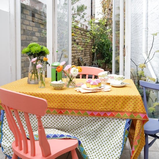 Bright sunroom with layered textiles