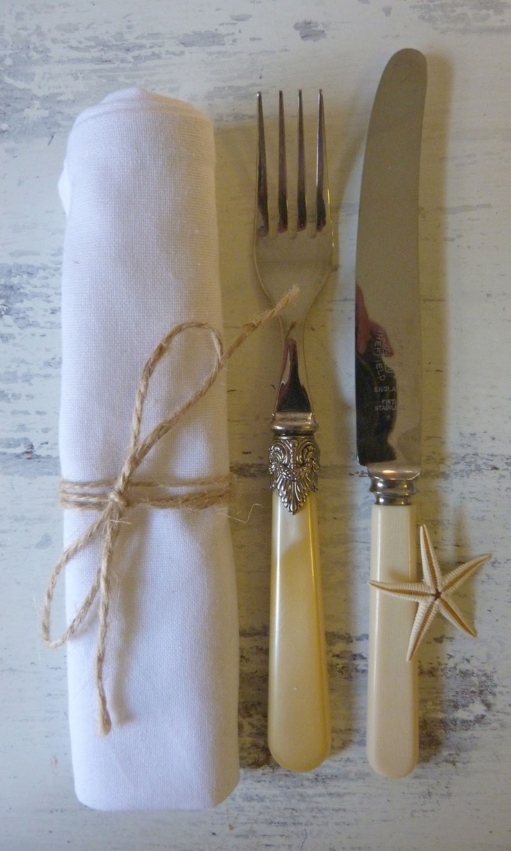 Elegant coastal dinner setting with blue and white china