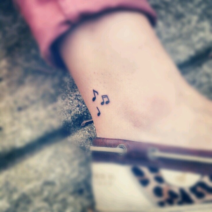 Bass clef tattoo