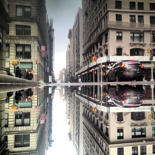 Urban reflection puddle NYC
