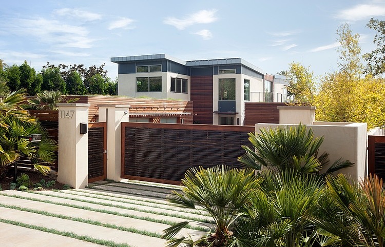 Pool house clad in warm wood