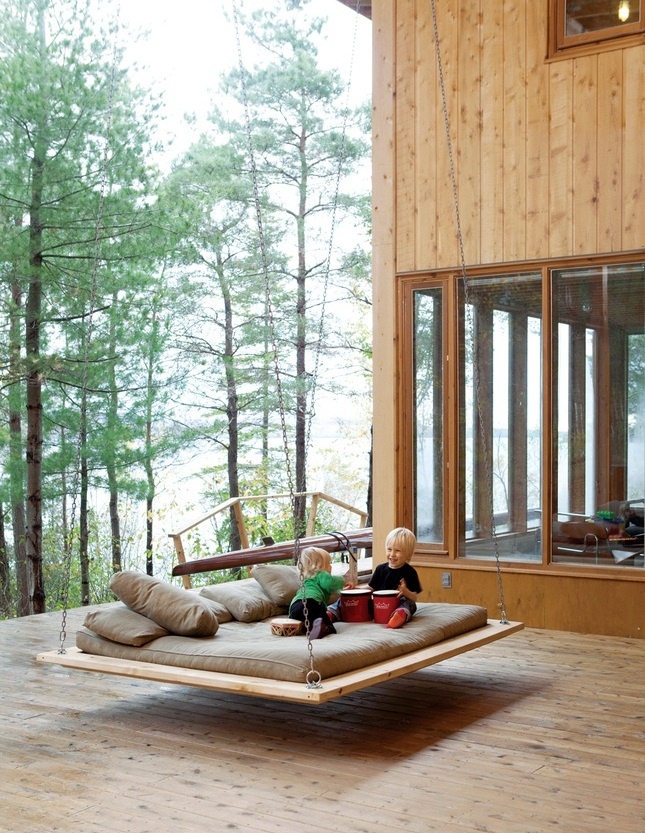 Tall room with hanging floating bed