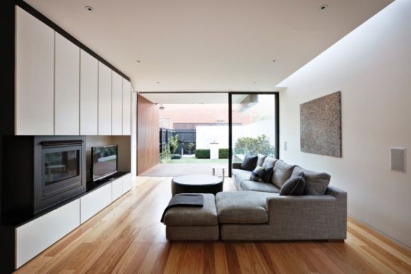 Timber deck and manicured lawn at the rear