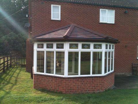Home exterior with conservatory area