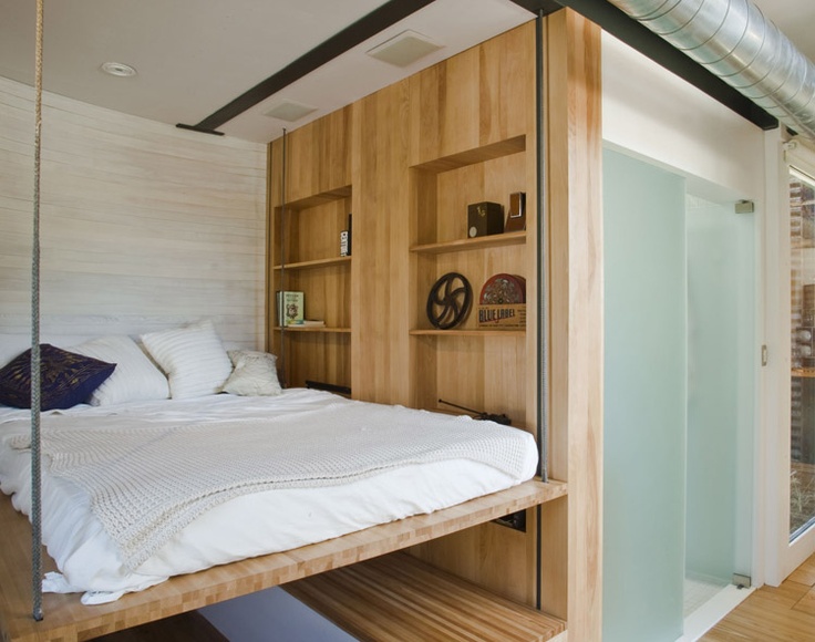 Minimal floating bed with open floor beneath