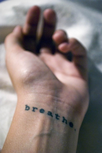 Bold line wrist tattoo design inspiration