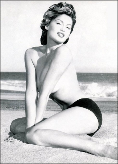 women-celebrity02 Beach black-and-white portrait with sculpted waves and high-contrast sunlight