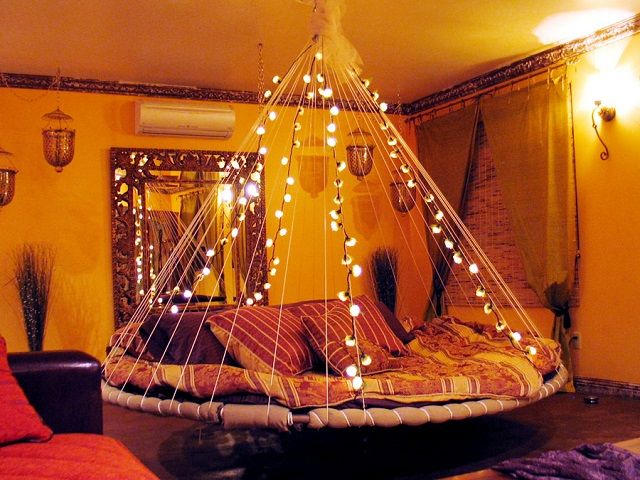 Floating bed with scenic backdrop