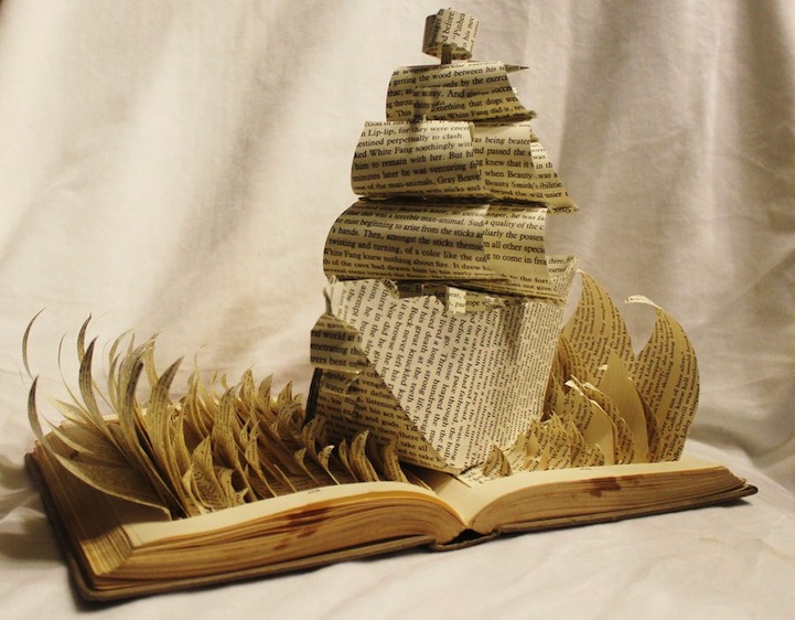 Galleon book sculpture with sails cut from printed pages