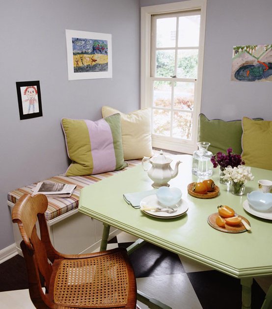 Mint octagonal table with lavender walls and checkered floor