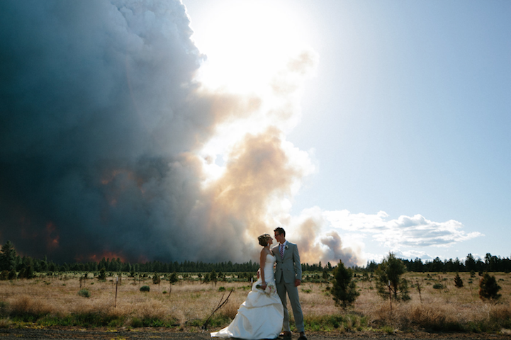 Oregon wildfire wedding image showing couple and landscape under smoke