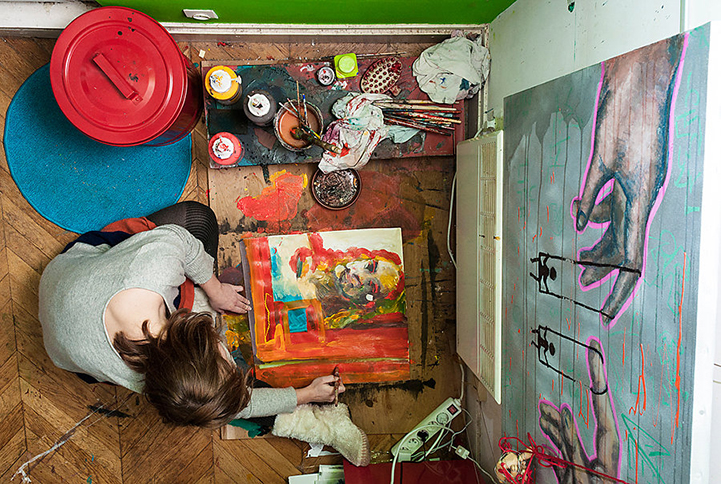 Instant Life: person photographed from above in a private room