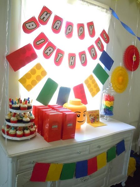 LEGO birthday banner and dresser display with favor bags