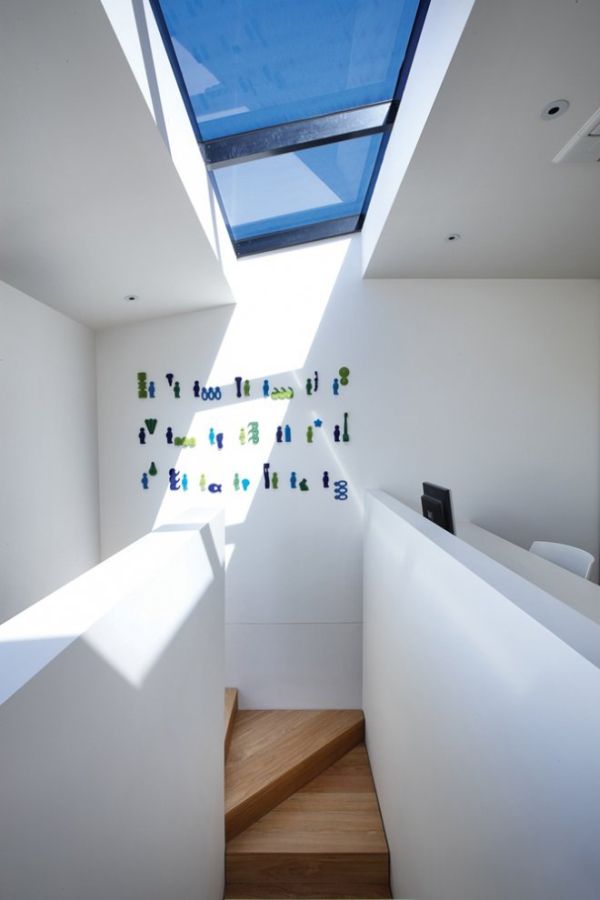 Interior living space with timber floors and garden view