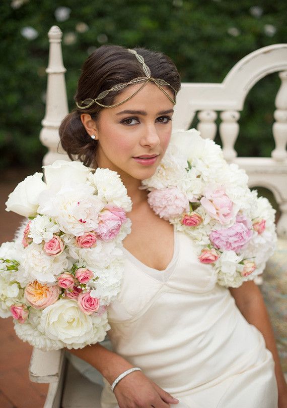 Bridal cape with delicate trim