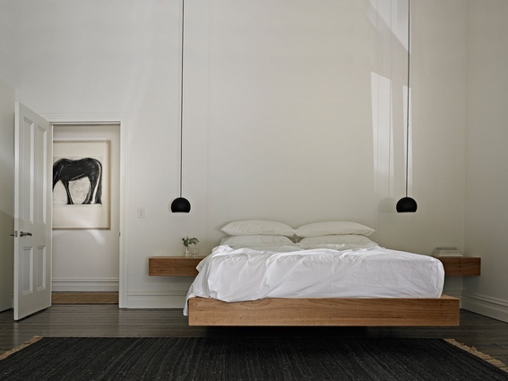 Low floating bed near window