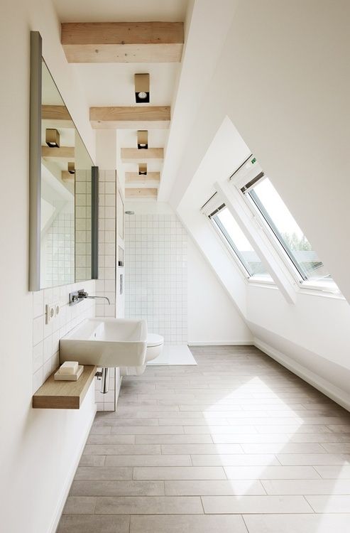 Tall attic bathroom perspective
