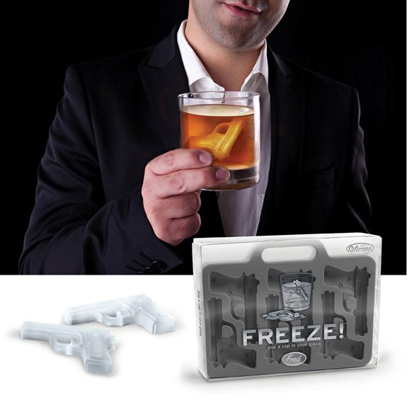 Freeze handgun shaped ice cubes in a whiskey glass