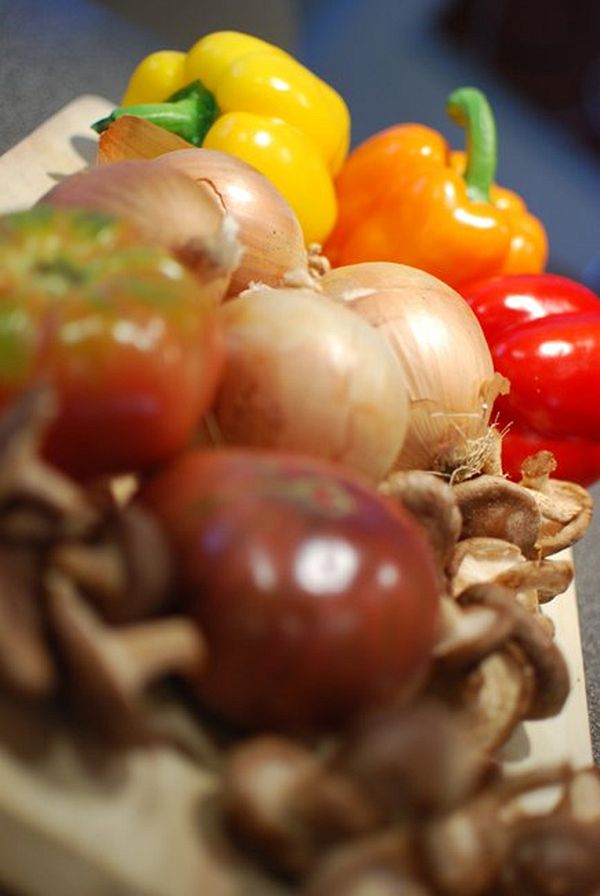Brandon-Matzek-food-photography07 Vertical still life of onions, peppers, tomatoes, and mushrooms